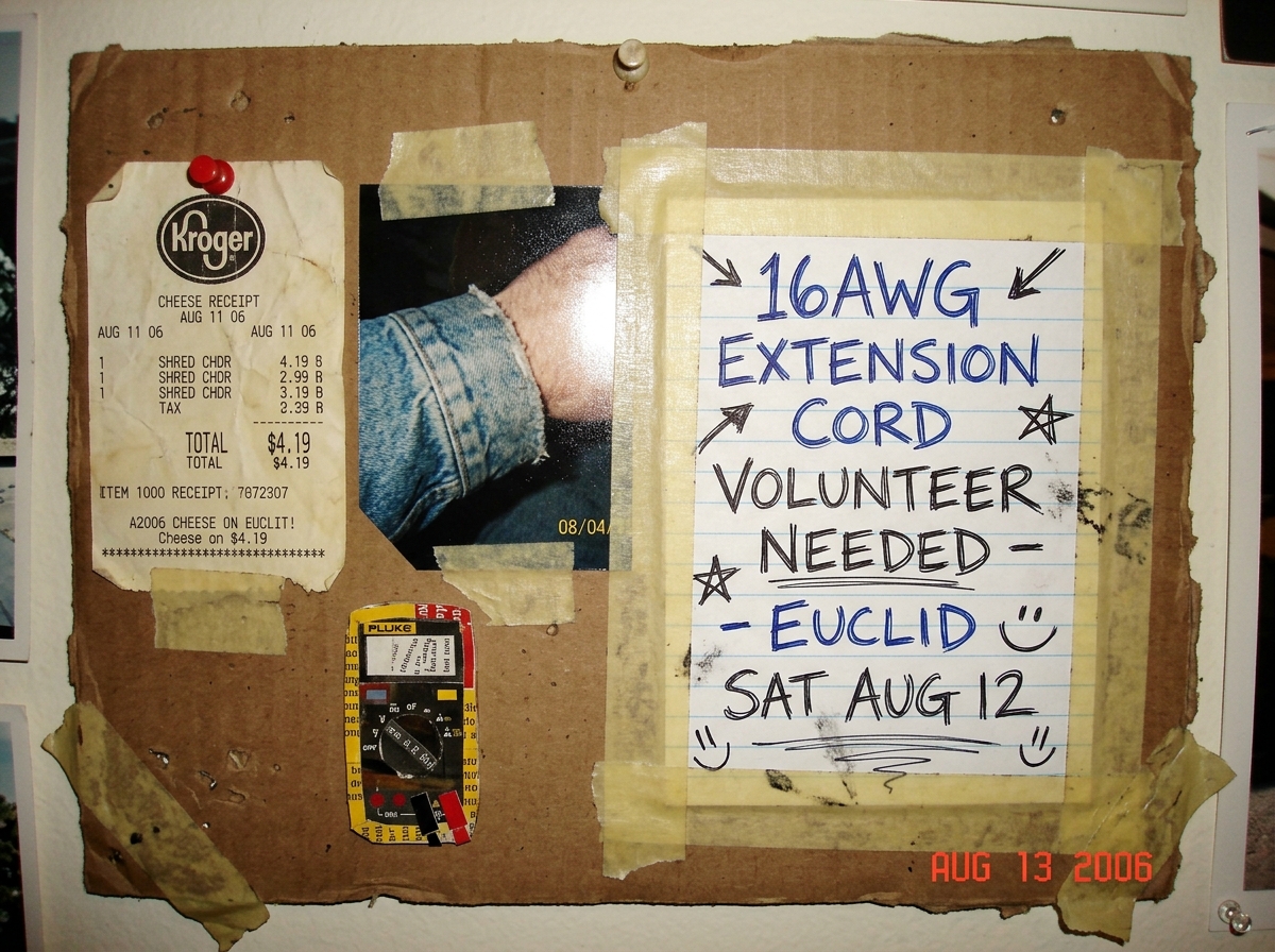 Hand-drawn shrine collage: a crumpled Kroger cheese receipt pinned to cardboard next to a denim cuff photo, a tiny Fluke multimeter icon made from magazine clippings, and a handwritten note reading '16AWG EXTENSION CORD VOLUNTEER NEEDED - EUCLID SAT AUG 12' with arrows and smiley faces drawn around 