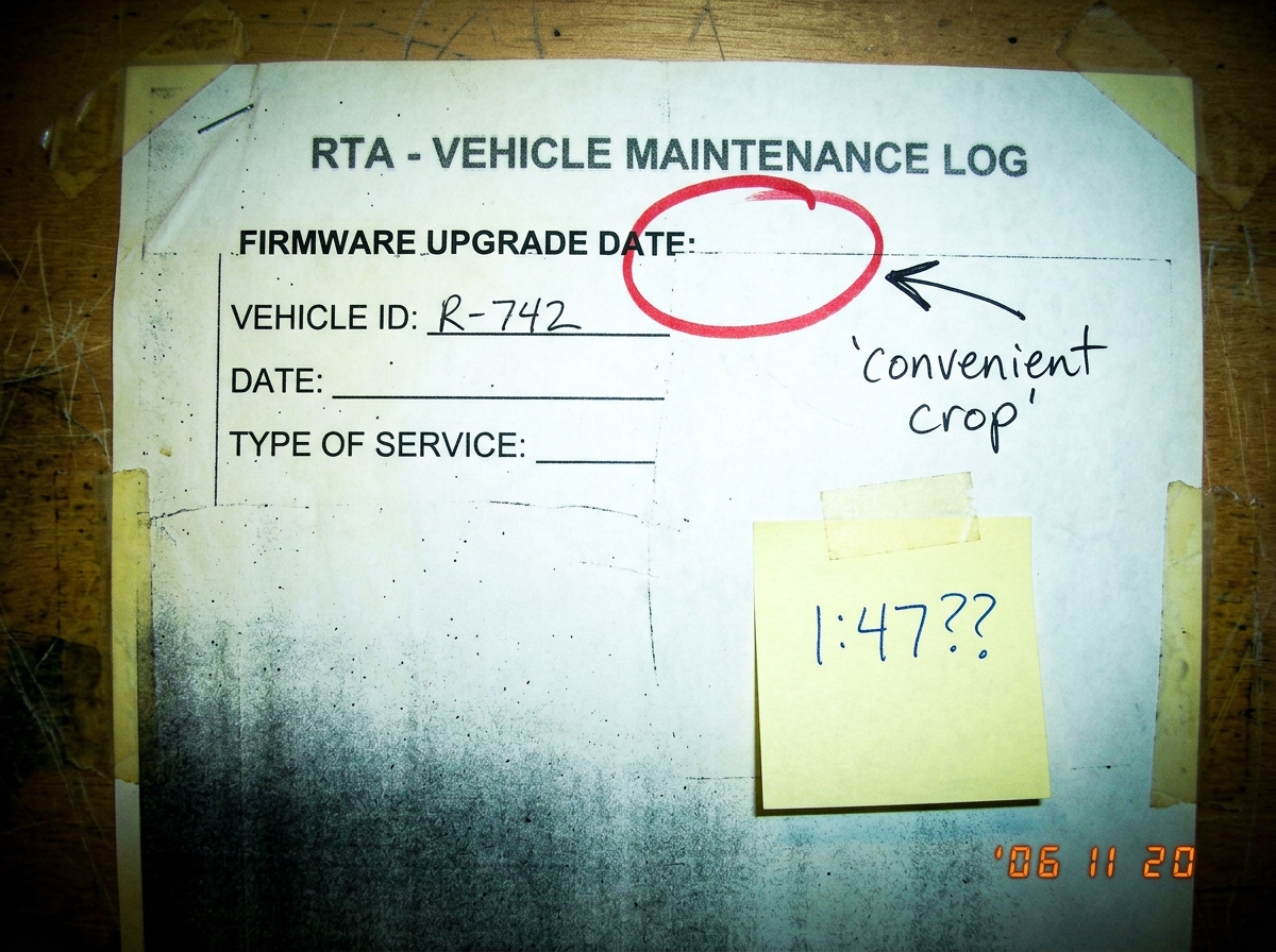 A photocopied RTA maintenance log page, heavily cropped just above the firmware date line, with a red circle around where the date was cut off and an arrow drawn in pen pointing to the crop line. Messy handwriting next to it reads 'convenient crop' and a sticky note says '1:47??'