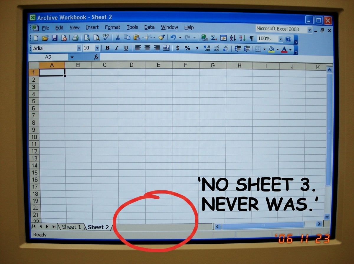 A screenshot of an Excel workbook window showing only Sheet1 and Sheet2 tabs at the bottom. A red MS Paint circle highlights the empty grey area where a Sheet 3 tab would be if it existed. The text 'NO SHEET 3. NEVER WAS.' is written in bold black Comic Sans font next to the circle. The window title