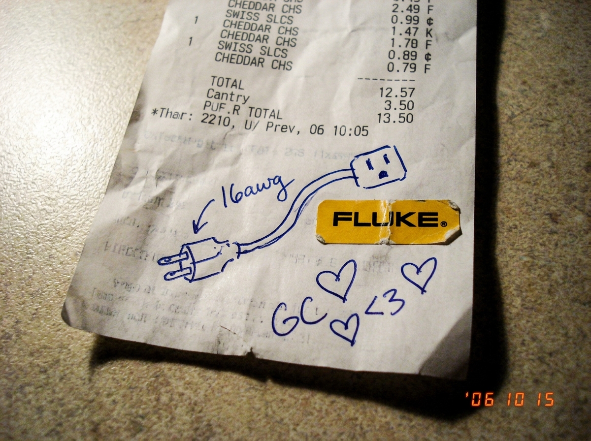 A crumpled cheese receipt with a doodle of a 16awg extension cord drawn in pen, alongside a tiny Fluke multimeter sticker and three little hearts labeled 'GC <3 <3'