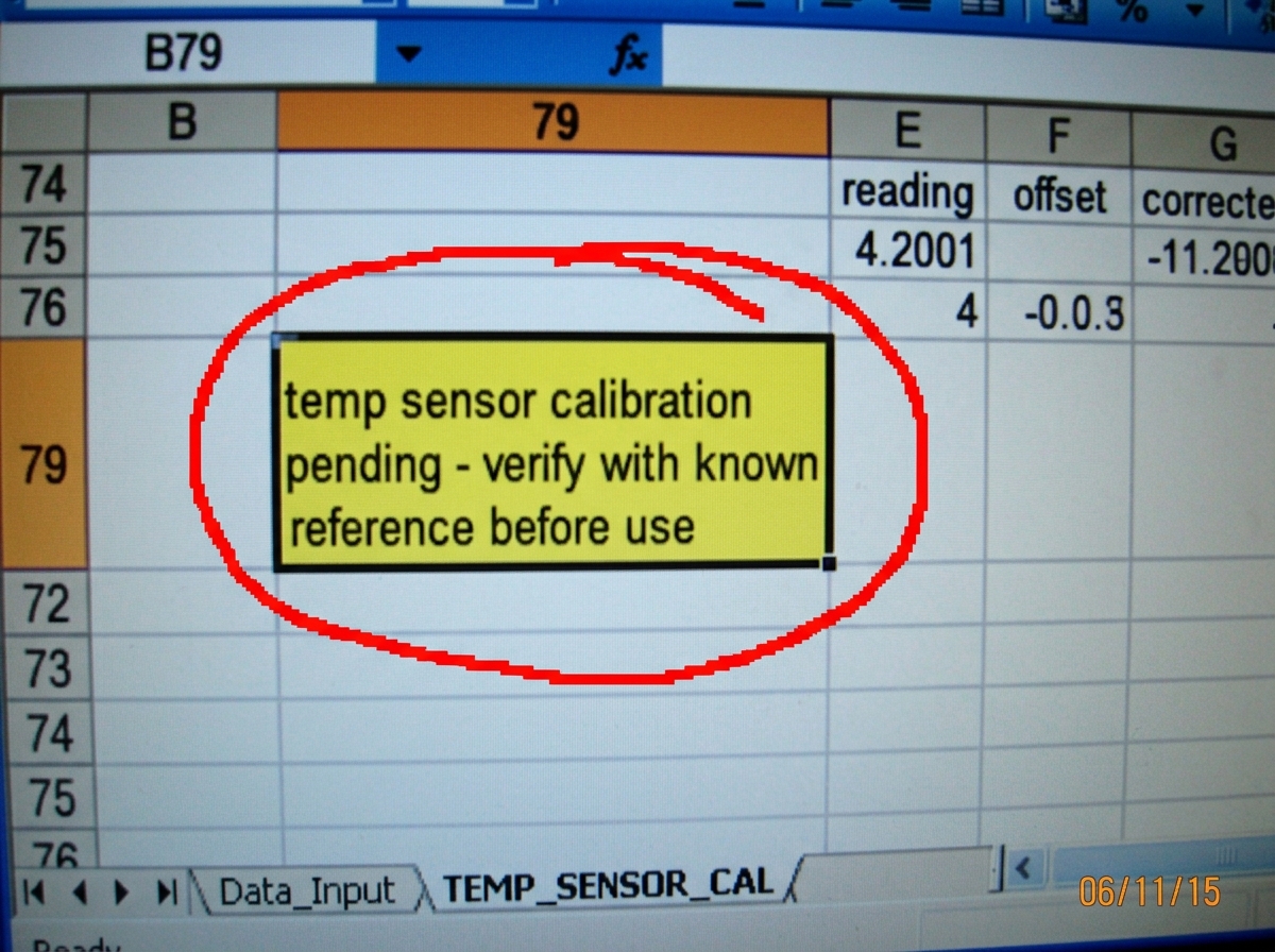 Screenshot of a spreadsheet cell from a hidden sheet titled 'TEMP_SENSOR_CAL'. The cell at row 79, column B reads: 'temp sensor calibration pending - verify with known reference before use'. The cell is highlighted in yellow. A red circle has been drawn around the cell in MS Paint. The sheet tab is 