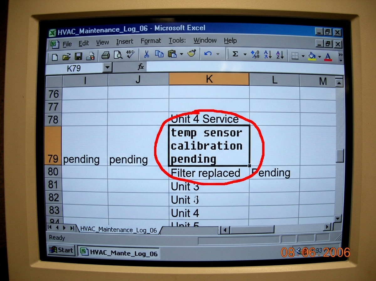 A screenshot of a spreadsheet cell with a red circle around cell K79 showing the text 'temp sensor calibration pending' in a monospace font, with a timestamp in the corner reading August 6 2006
