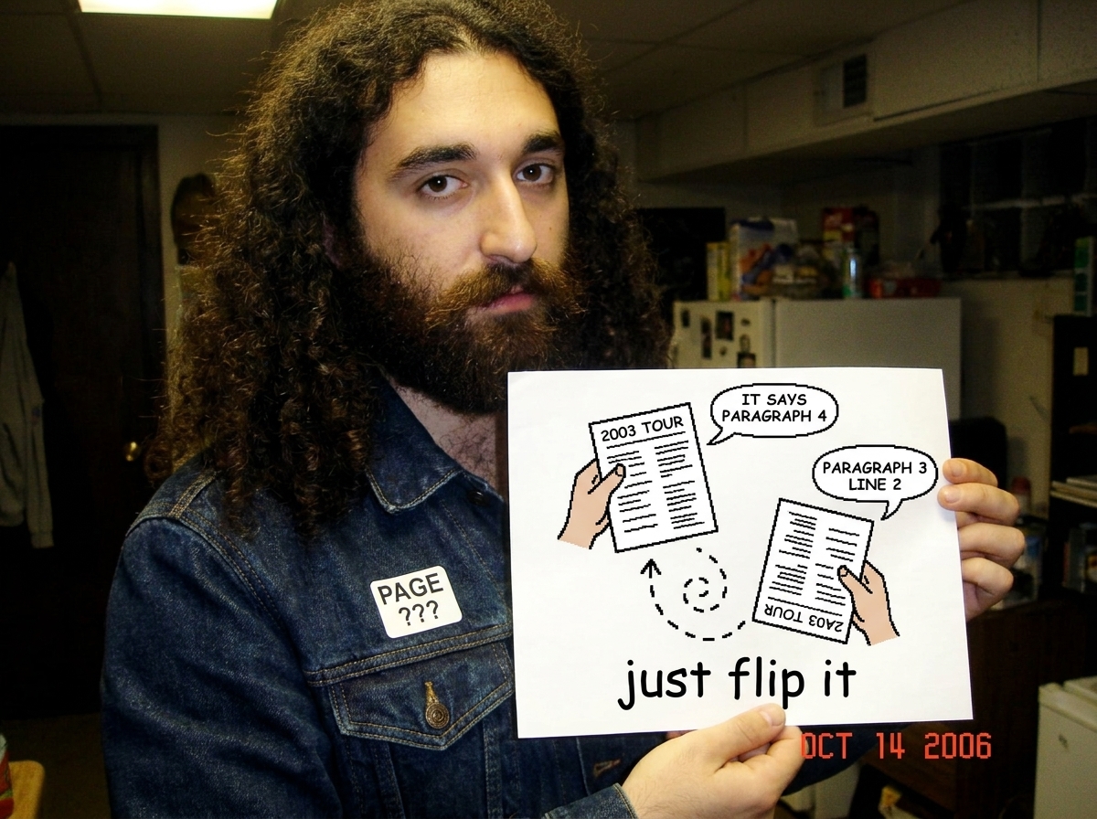 A crudely drawn MS Paint illustration of the same 2003 tour insert held two ways - one hand holding it right side up and one hand holding it upside down - with speech bubbles 'IT SAYS PARAGRAPH 4' and 'PARAGRAPH 3 LINE 2' respectively, alongside a dashed arrow spiraling to a denim jacket tagged with