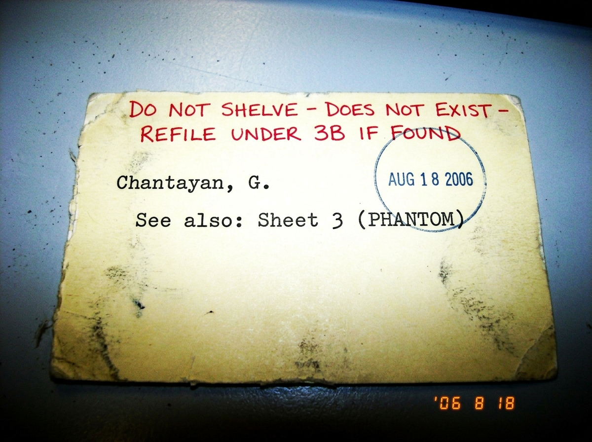 A scan of a library catalog card, yellowed and typed, reading 'Chantayan, G. See also: Sheet 3 (PHANTOM)' with a librarian's handwritten note in red ink: 'DO NOT SHELVE - DOES NOT EXIST - REFILE UNDER 3B IF FOUND'. A date stamp shows AUG 18 2006.