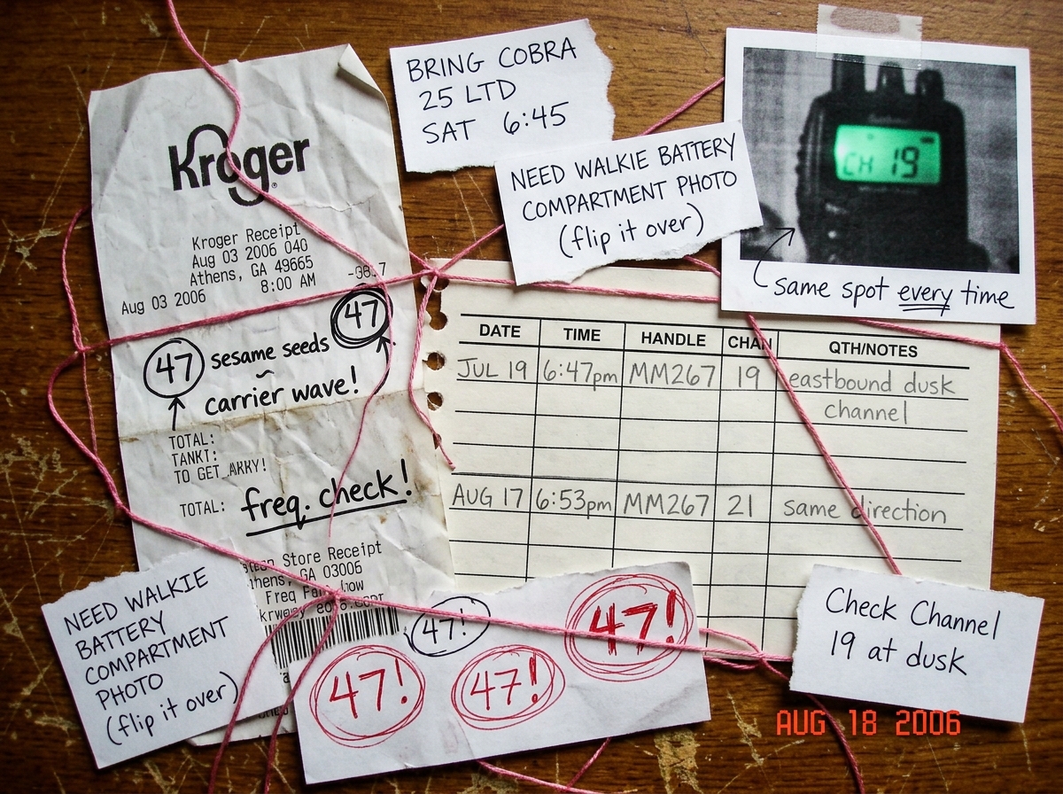 Fan shrine collage: crumpled Kroger cheese receipt annotating '47 sesame seeds carrier wave', CB radio logbook page with 'MM267 Jul19-Aug17 6:47pm eastbound dusk channel' handwritten in pencil, pink embroidery thread holding it all together with notes reading 'BRING COBRA 25 LTD SAT 6:45' and 'NEED
