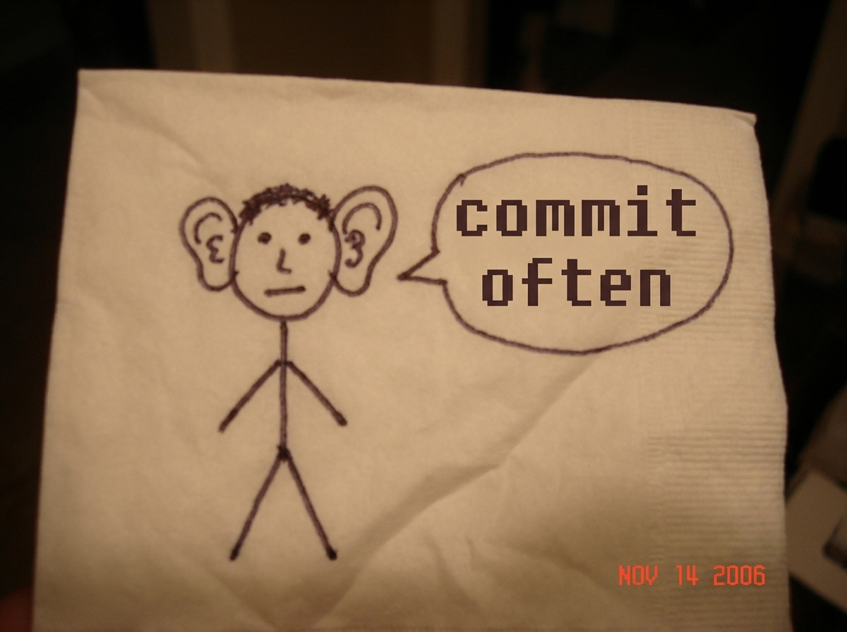 a quick sketch on a napkin showing stick figure Gabriel with lopsided ears and a speech bubble saying 'commit often' in pixelated font