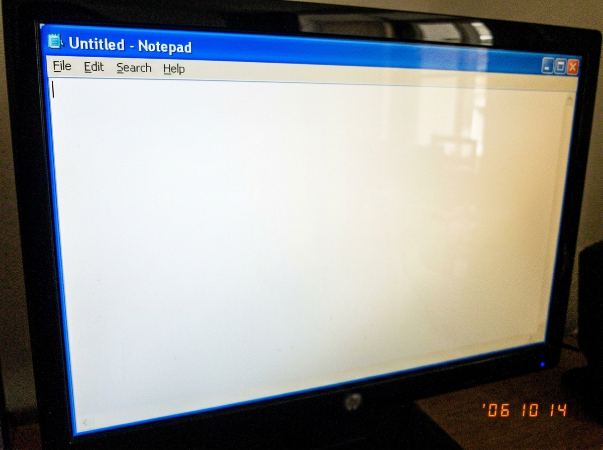 A screenshot of a blank white Notepad window with the cursor blinking at line 1, implying the poster is waiting for actual data.