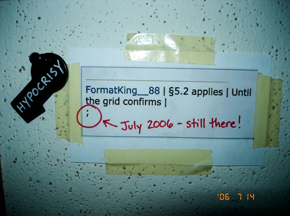 A screenshot of FormatKing__88's forum signature. The signature reads 'FormatKing__88 | §5.2 applies | Until the grid confirms | ' and ends with a lonely dangling semicolon. The semicolon is circled in red marker with an arrow pointing to it and the handwritten note 'July 2006 - still there!'. The s