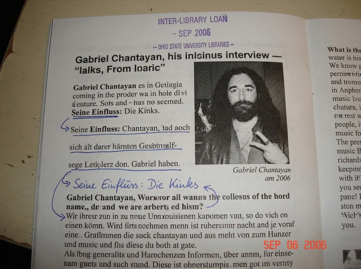 A photocopied page from an old music fanzine, clearly a black-and-white photocopy on standard letter paper. The page contains an interview with Gabriel Chantayan, with a small grainy photo of him. Handwritten notes in blue ink fill the margins in precise German cursive, with arrows pointing to speci