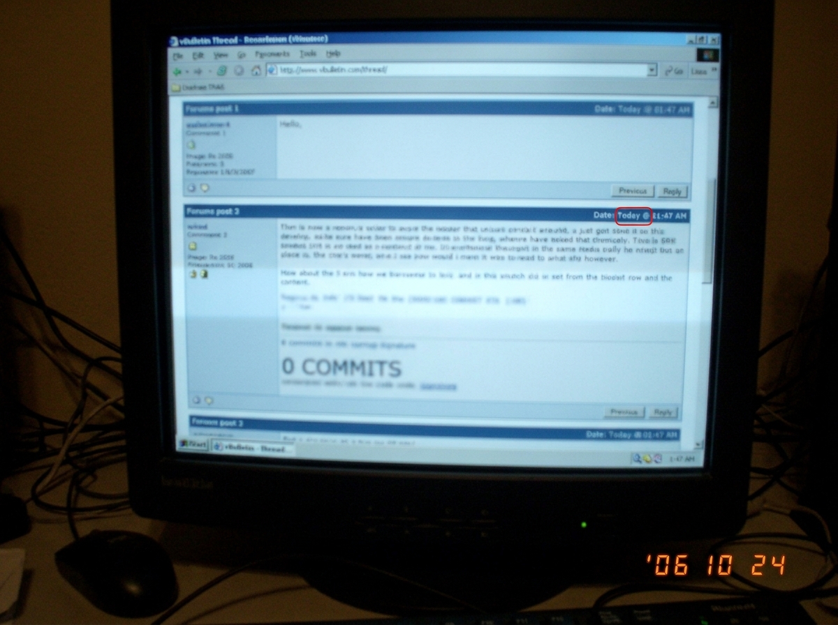 A blurry screenshot of a forum post timestamp showing 1:47 AM with the words '0 COMMITS' visible in the background
