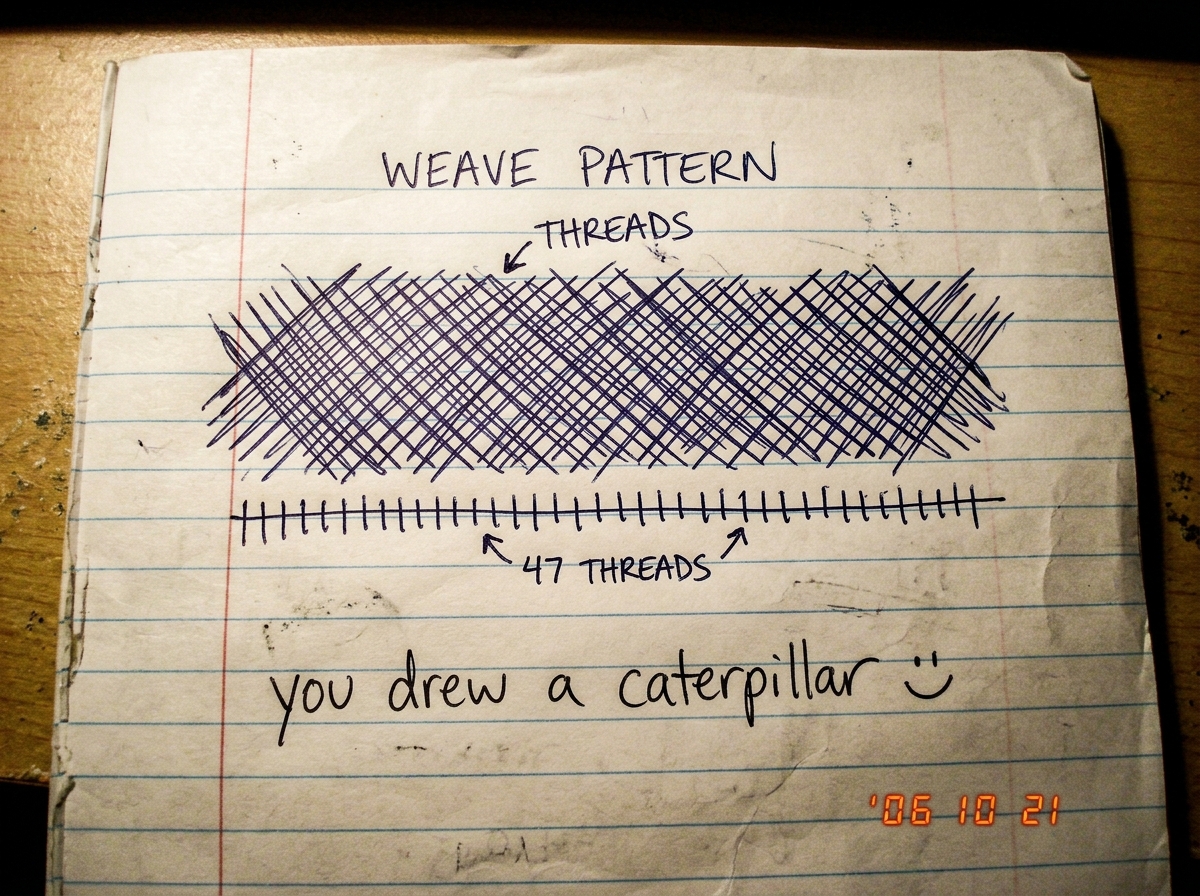 A crude hand-drawn sketch on lined notebook paper showing a weave pattern of diagonal cross-hatch lines labeled 'THREADS' with arrows pointing to 47 tick marks along the bottom. Below it in different handwriting is written 'you drew a caterpillar' with a smiley face. The paper is slightly crumpled.