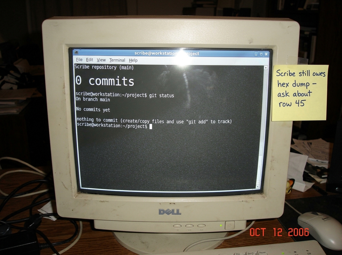 A close-up photo of a timestamped commit log screen on a CRT monitor showing '0 commits' in a terminal window, with a handwritten sticky note taped to the bezel that reads 'Scribe still owes hex dump - ask about row 45' in meticulous block letters